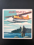 Float Plane & Fisherman Adirondack Coaster