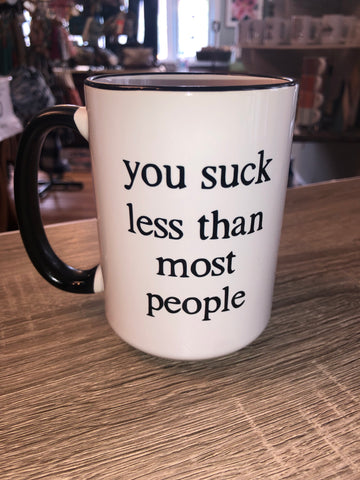 You Suck Less Mug